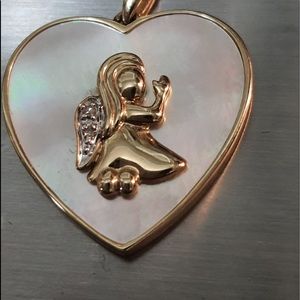 10k solid gold diamond and MOP Pendant